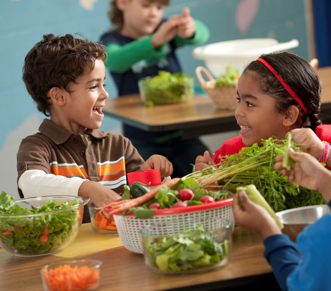 Children with vegetables